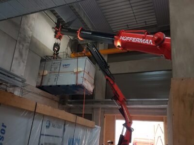 Maschineneinbringung mit Elektrokran - Lift and Shift Hüffermann Gruppe
